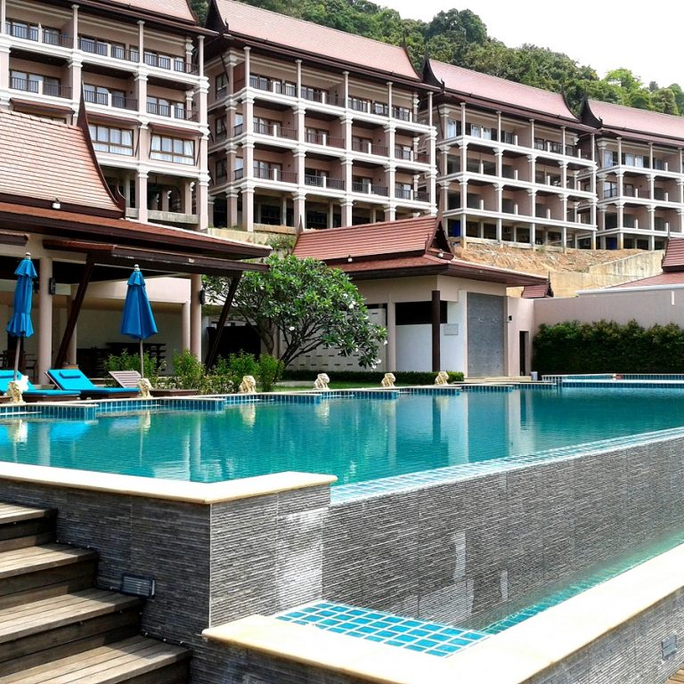 timeshare complex with a large swimming pool